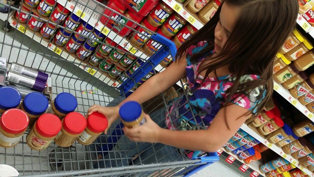 Mom and kids shopping for a cause